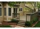 Lovely back deck with railing, stairs to backyard, and sliding glass door access to house at 7114 Mountain Brush Cir, Highlands Ranch, CO 80130