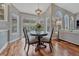 Cozy breakfast nook with hardwood floors and sliding glass door at 7114 Mountain Brush Cir, Highlands Ranch, CO 80130