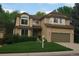 Charming two-story home with well-maintained landscaping at 7114 Mountain Brush Cir, Highlands Ranch, CO 80130