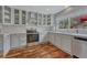 Bright kitchen features stainless steel appliances and shaker cabinets with stylish countertops at 7114 Mountain Brush Cir, Highlands Ranch, CO 80130