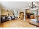 Bright open floor plan with wood floors connecting living area and kitchen with lots of light at 11855 Humboldt Dr, Northglenn, CO 80233