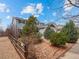 Charming home with a manicured lawn and attractive landscaping at 306 Monares Ln, Erie, CO 80516