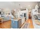 Stylish kitchen with granite countertops, stainless steel appliances, and central island with bar seating at 1788 Holmby Ct, Castle Rock, CO 80104
