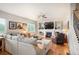 Inviting living room with hardwood floors, fireplace and comfortable seating at 1788 Holmby Ct, Castle Rock, CO 80104