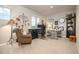Brightly lit home office with a comfortable chair, computer and decorative accents at 1788 Holmby Ct, Castle Rock, CO 80104