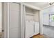 Bright laundry area equipped with washer and dryer at 8335 Fairmount Dr # 9-201, Denver, CO 80247