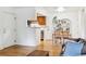 Open-concept living room with a view of the kitchen and a dining area at 8335 Fairmount Dr # 9-201, Denver, CO 80247