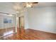 Main bedroom with mirrored closet and access to hallway at 1885 S Quebec Way # L102, Denver, CO 80231