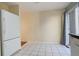 Simple dining area with hardwood floors and light walls at 1885 S Quebec Way # L102, Denver, CO 80231