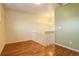 Dining area with wood floors and view of staircase at 1885 S Quebec Way # L102, Denver, CO 80231