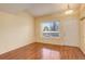 Bright entryway with wood floors and a window at 1885 S Quebec Way # L102, Denver, CO 80231