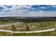 Expansive landscape with walking trails and natural scenery under a cloudy sky at 6235 Stable View St, Castle Pines, CO 80108