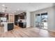 Open kitchen design with stainless steel appliances and seamless access to the backyard patio at 3314 N Haleyville Ct, Aurora, CO 80019