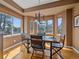 Sun-drenched dining area with mountain views perfect for tranquil meals at 3173 Gold Yarrow Ln, Evergreen, CO 80439
