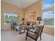 Comfortable living room with high ceilings and natural light at 3173 Gold Yarrow Ln, Evergreen, CO 80439