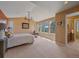 Spacious main bedroom filled with natural light and stunning mountain views at 3173 Gold Yarrow Ln, Evergreen, CO 80439