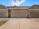 Attached garages with driveway offer plenty of room to park at 14400 Albrook Dr # 43, Denver, CO 80239