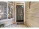 Charming front entryway featuring a decorative glass window and a solid wood door at 14400 Albrook Dr # 43, Denver, CO 80239