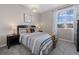 Relaxing bedroom featuring a comfy bed, natural light, and a calming color scheme at 22610 E Ontario Dr # 204, Aurora, CO 80016