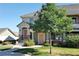Charming two-story townhome with well-maintained landscaping and inviting front entrance at 22610 E Ontario Dr # 204, Aurora, CO 80016