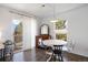 Cozy dining area with sliding glass doors to a balcony and lots of natural light at 12831 Mayfair Way # F, Englewood, CO 80112