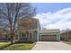 Charming two-story home with a well-maintained lawn and attached garage. Garage number is 381 at 381 Tynan Dr, Erie, CO 80516