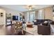 Cozy living room featuring hardwood floors, an area rug, modern decor, and lots of natural light at 1560 Olympia Cir # 108, Castle Rock, CO 80104