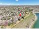 Overhead view of property near lake with lush greenery and beautiful surroundings at 2590 W Long Cir, Littleton, CO 80120