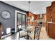 Eat in kitchen featuring stainless appliances and access to an outdoor area at 2590 W Long Cir, Littleton, CO 80120