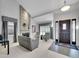 Inviting living room with stone fireplace, modern decor, and a welcoming atmosphere at 2590 W Long Cir, Littleton, CO 80120