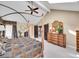 Spacious main bedroom with a canopy bed, a large dresser, and stylish decor at 2590 W Long Cir, Littleton, CO 80120