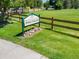A sign identifying 'Writers Vista Park' with meticulously landscaped surroundings at 2590 W Long Cir, Littleton, CO 80120