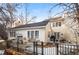 Deck with seating area and a grill, overlooking the backyard at 4530 S Verbena St # 309, Denver, CO 80237