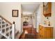 View of the staircase and dining room from the entryway at 4530 S Verbena St # 309, Denver, CO 80237