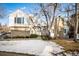 Inviting two-story home with stone accents and a manicured lawn at 4530 S Verbena St # 309, Denver, CO 80237