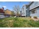 Large, well-maintained backyard featuring a spacious deck at 4290 Cottonwood Lakes Blvd, Thornton, CO 80241