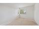 Neutral bedroom with light carpet and a window offering natural light at 4290 Cottonwood Lakes Blvd, Thornton, CO 80241