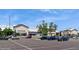 Exterior shot of a parking lot with a Banana Republic store in the background on a beautiful, clear day at 7325 S Houstoun Waring Cir, Littleton, CO 80120