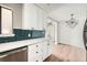 Eat-in kitchen features stainless appliances, granite countertops and modern backsplash at 15350 E Arizona Ave # 308, Aurora, CO 80017