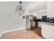 Eat-in kitchen features new stainless appliances and modern backsplash at 15350 E Arizona Ave # 308, Aurora, CO 80017