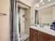 Modern bathroom with a stand-up shower with decorative backsplash, and a stylish vanity at 12610 E Villanova Dr, Aurora, CO 80014