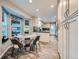 Bright kitchen with an eat-in area, modern appliances, and plenty of cabinet space for storage and convenience at 12610 E Villanova Dr, Aurora, CO 80014
