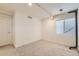 Neutral carpeted bedroom with natural light, track lighting, and blinds for comfortable and practical living at 12771 Clermont St, Thornton, CO 80241