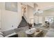 Bright foyer with high ceilings, staircase, and decorative mirror creating a grand and welcoming space at 12771 Clermont St, Thornton, CO 80241