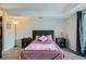 Comfortable bedroom with carpeted floors and great natural light at 2575 S Syracuse Way # B107, Denver, CO 80231