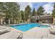 Inviting pool area with comfortable lounge chairs and a covered entrance at 2575 S Syracuse Way # B107, Denver, CO 80231