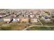 Expansive aerial shot featuring a park, pedestrian pathway, and diverse residential homes at 13753 Jasmine St, Thornton, CO 80602