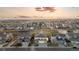 Elevated aerial view showcasing homes and a scenic landscape during a beautiful sunset at 13753 Jasmine St, Thornton, CO 80602