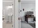 Stylish powder room features a pedestal sink and sleek black and white floor at 13753 Jasmine St, Thornton, CO 80602