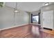 Inviting living room with hardwood floors, neutral paint, and ample natural light at 10732 Cook Ct, Northglenn, CO 80233